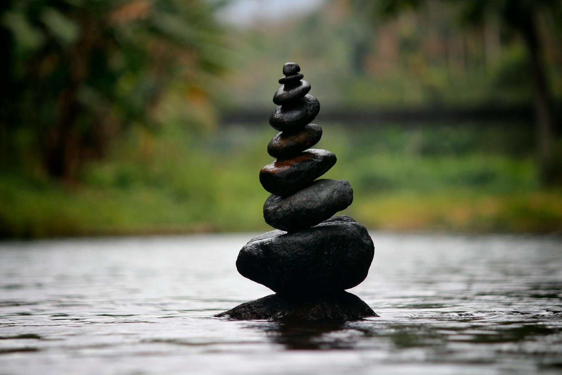 stacked rocks with water zen peace nature