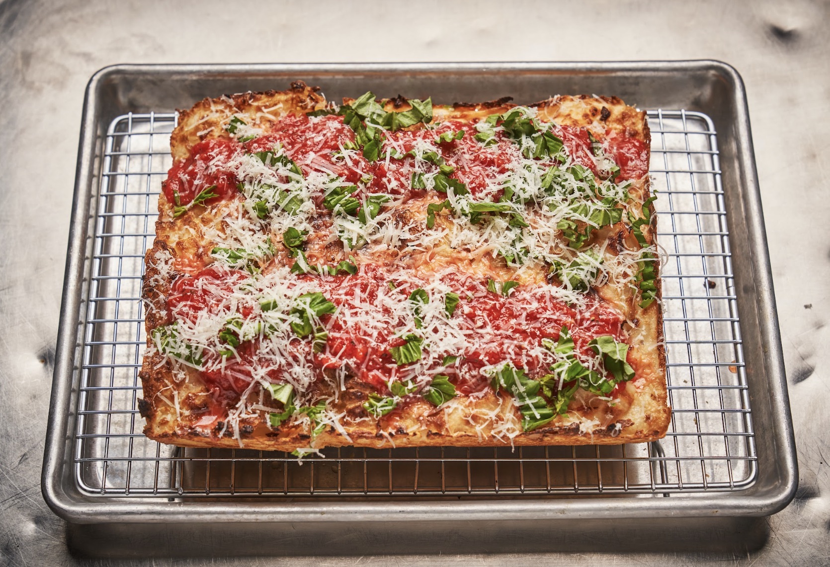 Boxcar Pizza Portland Detroit style pizza with parmesan