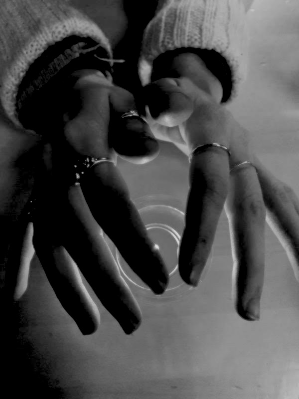 hands candle Scandinavia sweater