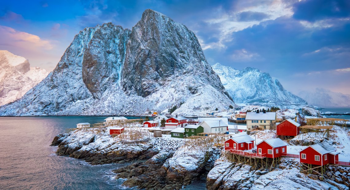 scandinavian airlines norway fjords travel ecotourism Lofoten mountains snow red houses