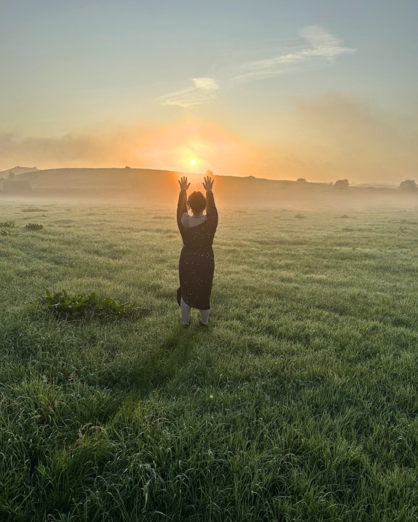 heather canfield run woman grass field sun sunset sunrise blue sky nature Ireland